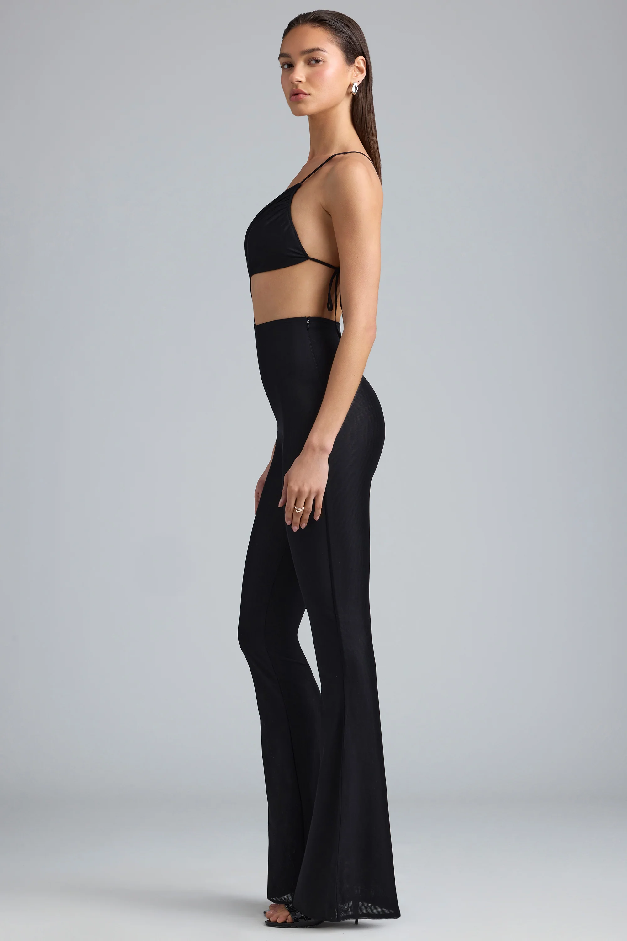 Metallic Ruched Cut-Out Flared Jumpsuit in Black - Image 7