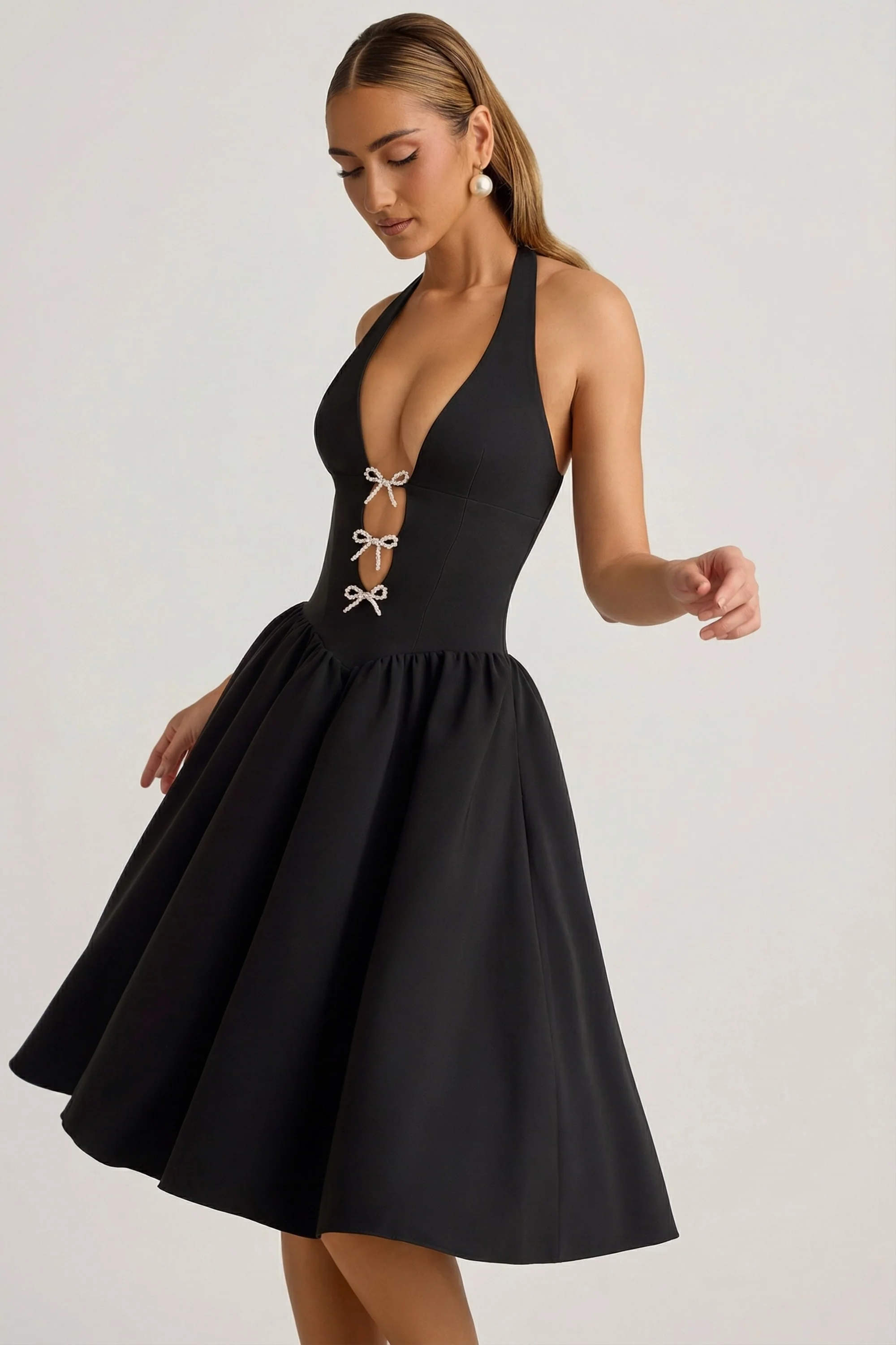 Halterneck Bow-Detail Midi Dress in Black - Image 9