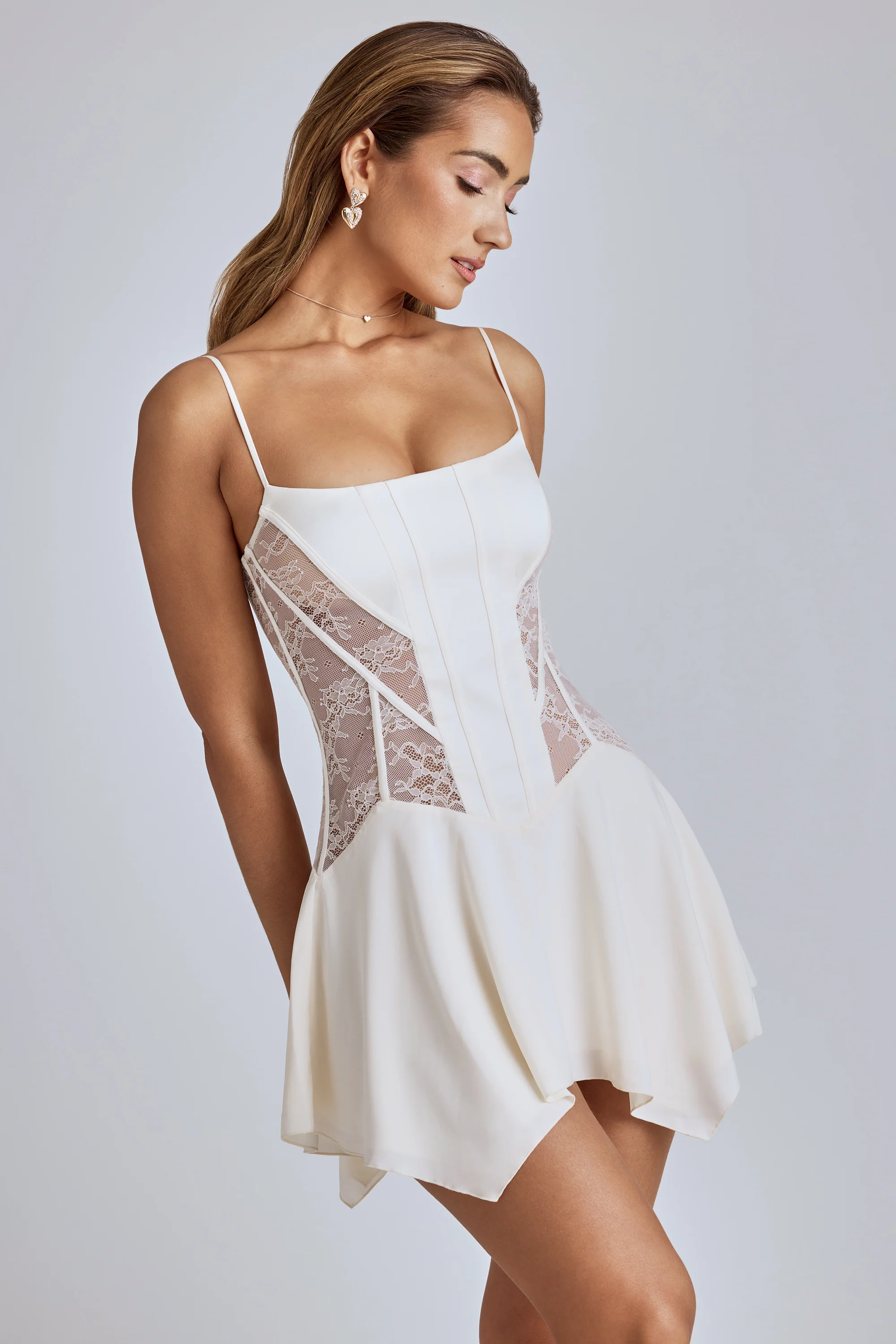 Lace Handkerchief Hem Mini Dress in Ivory - Image 10