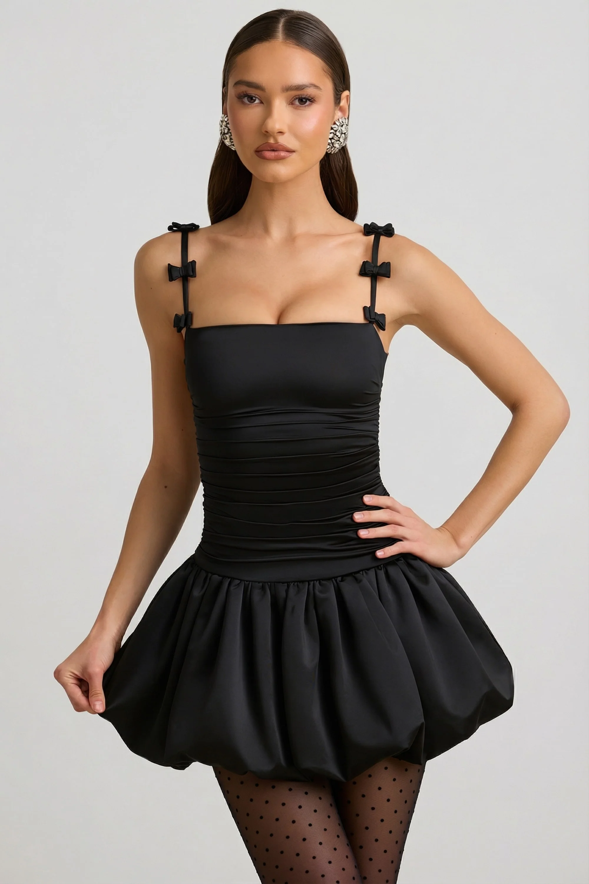 Bow-Detail Ruched Bubble Hem Mini Dress in Black - Image 6