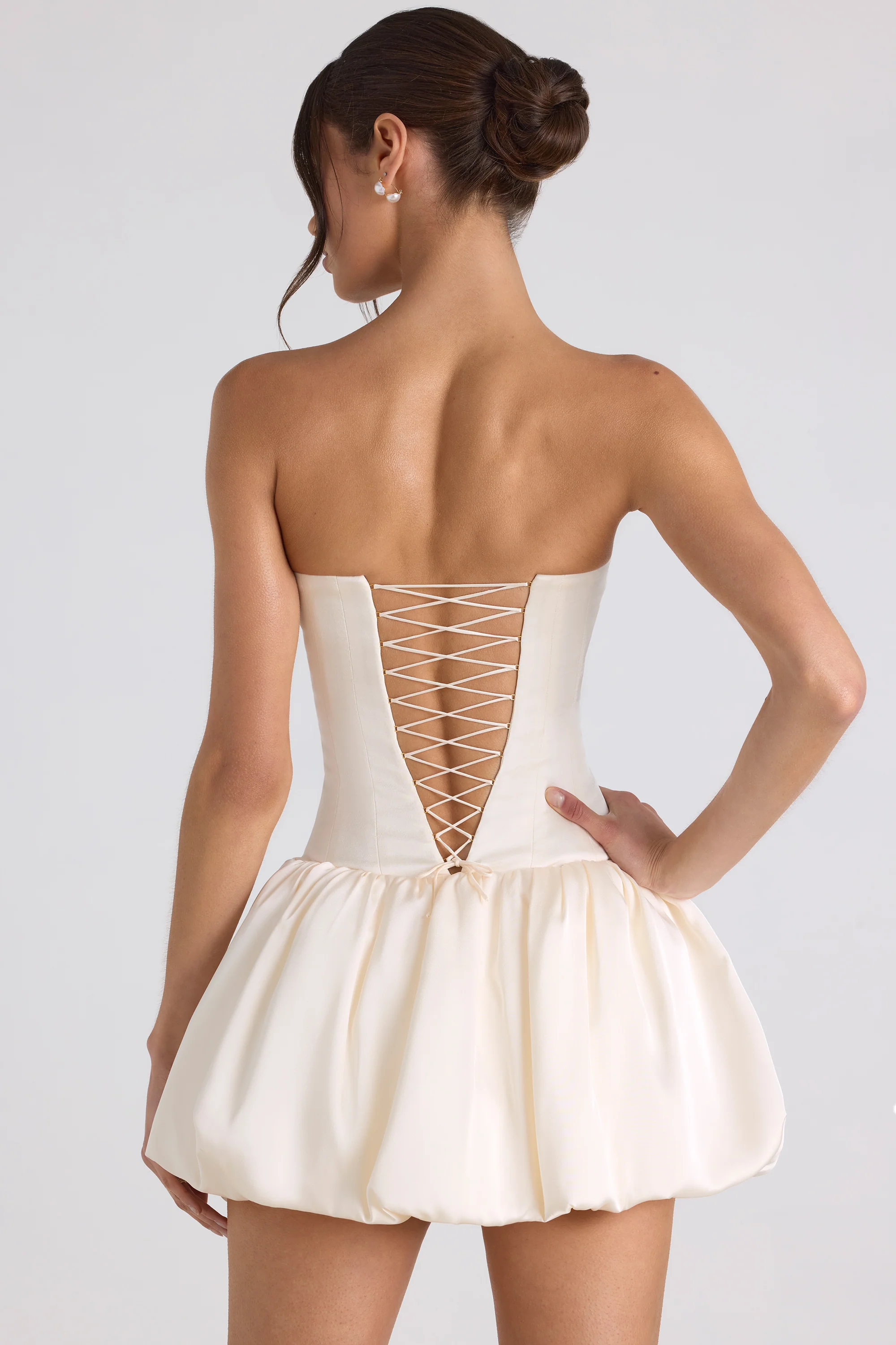 Lace-Up Bubble Hem Corset Mini Dress in Ivory - Image 2