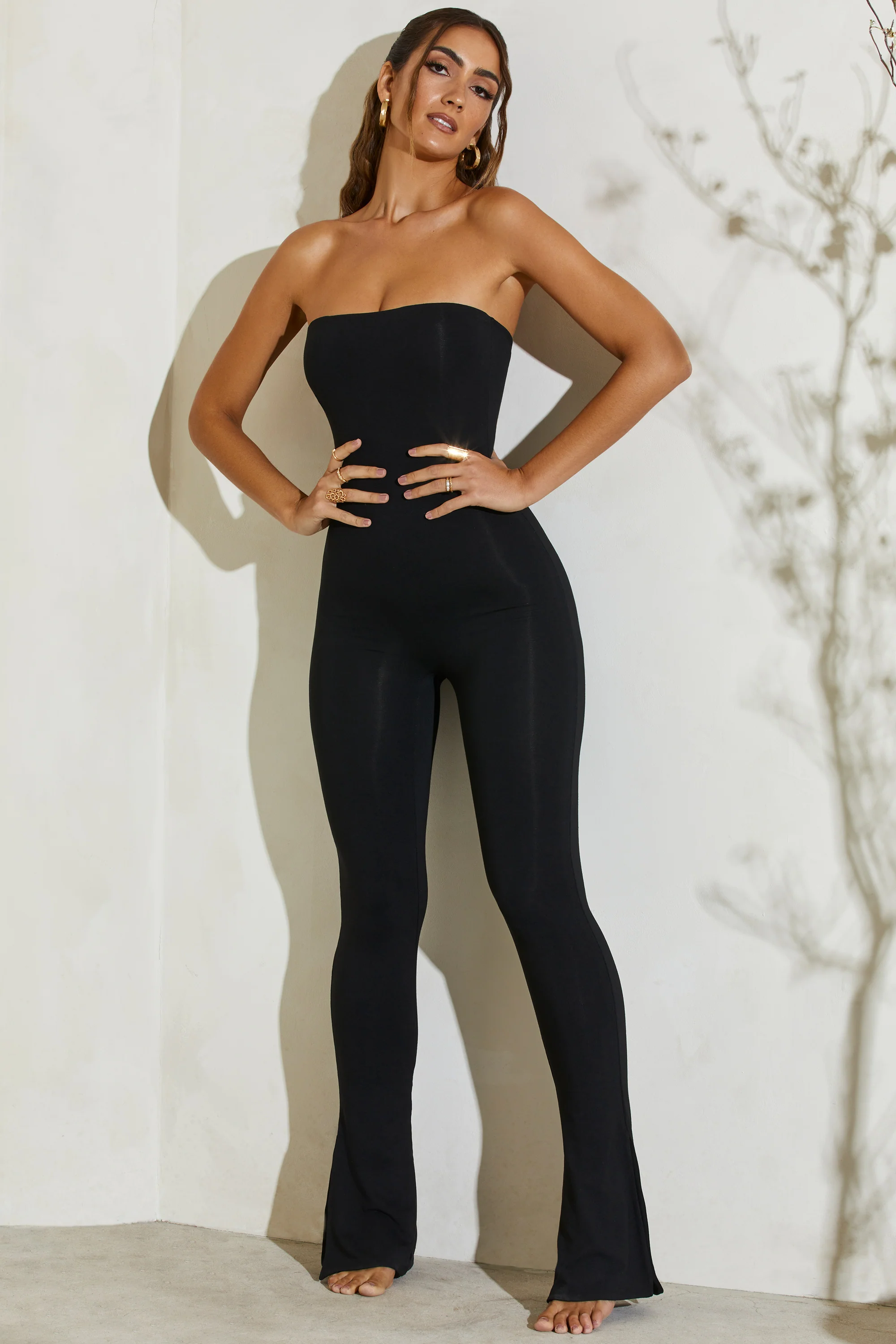 Strapless Flared Hem Jumpsuit in Black - Image 3
