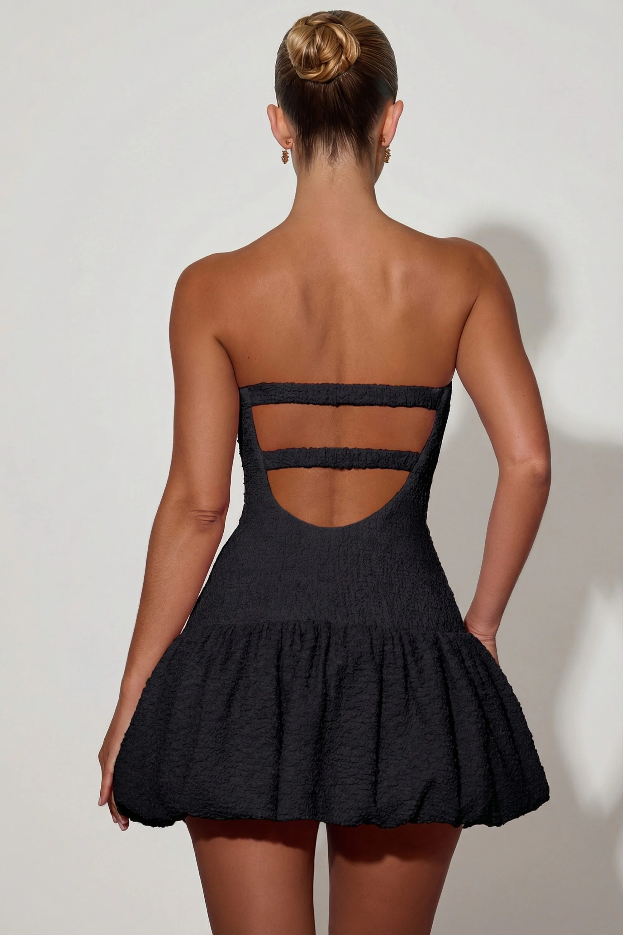 Cut-Out Bubble Hem Corset Mini Dress in Black - Image 2
