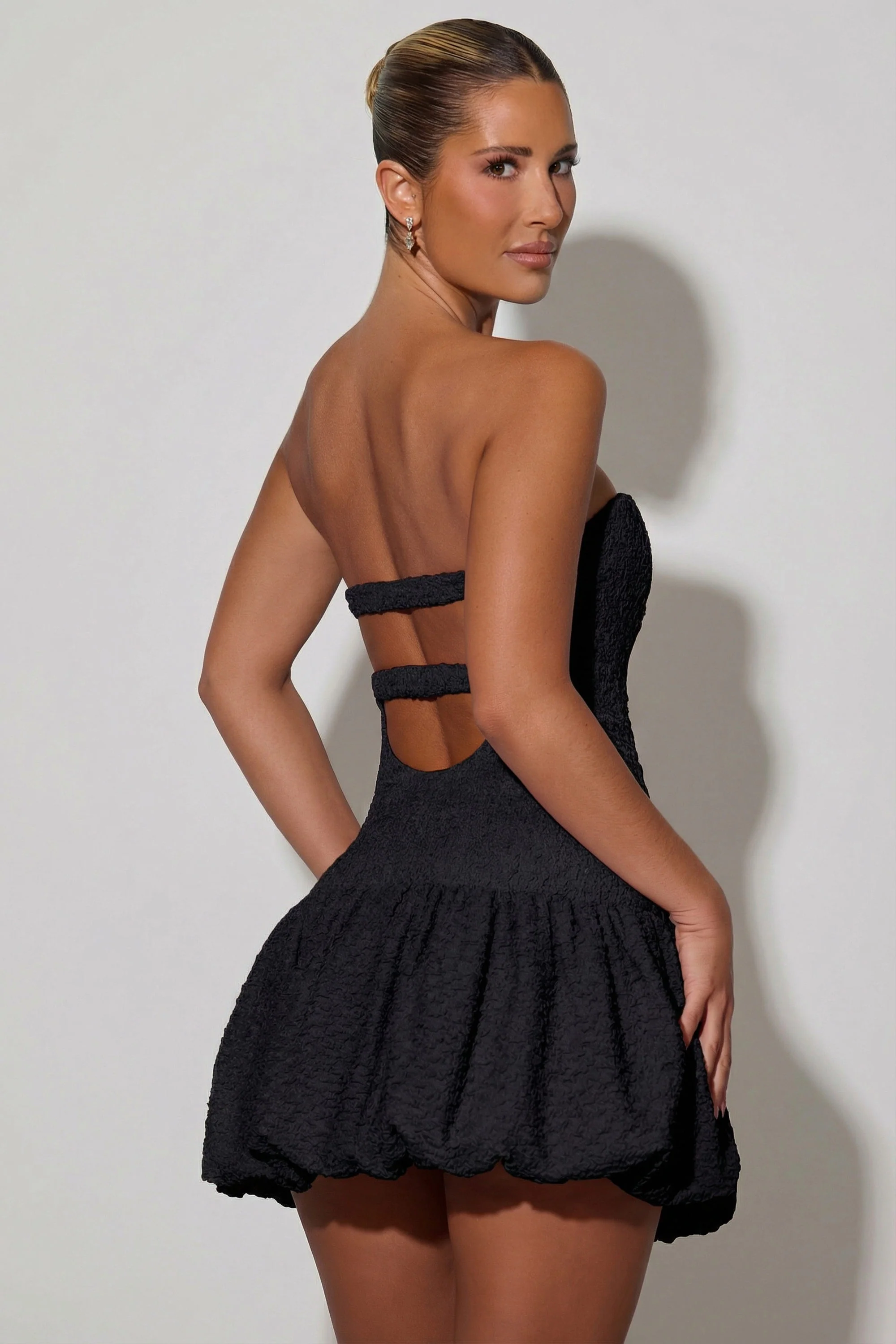 Cut-Out Bubble Hem Corset Mini Dress in Black - Image 6