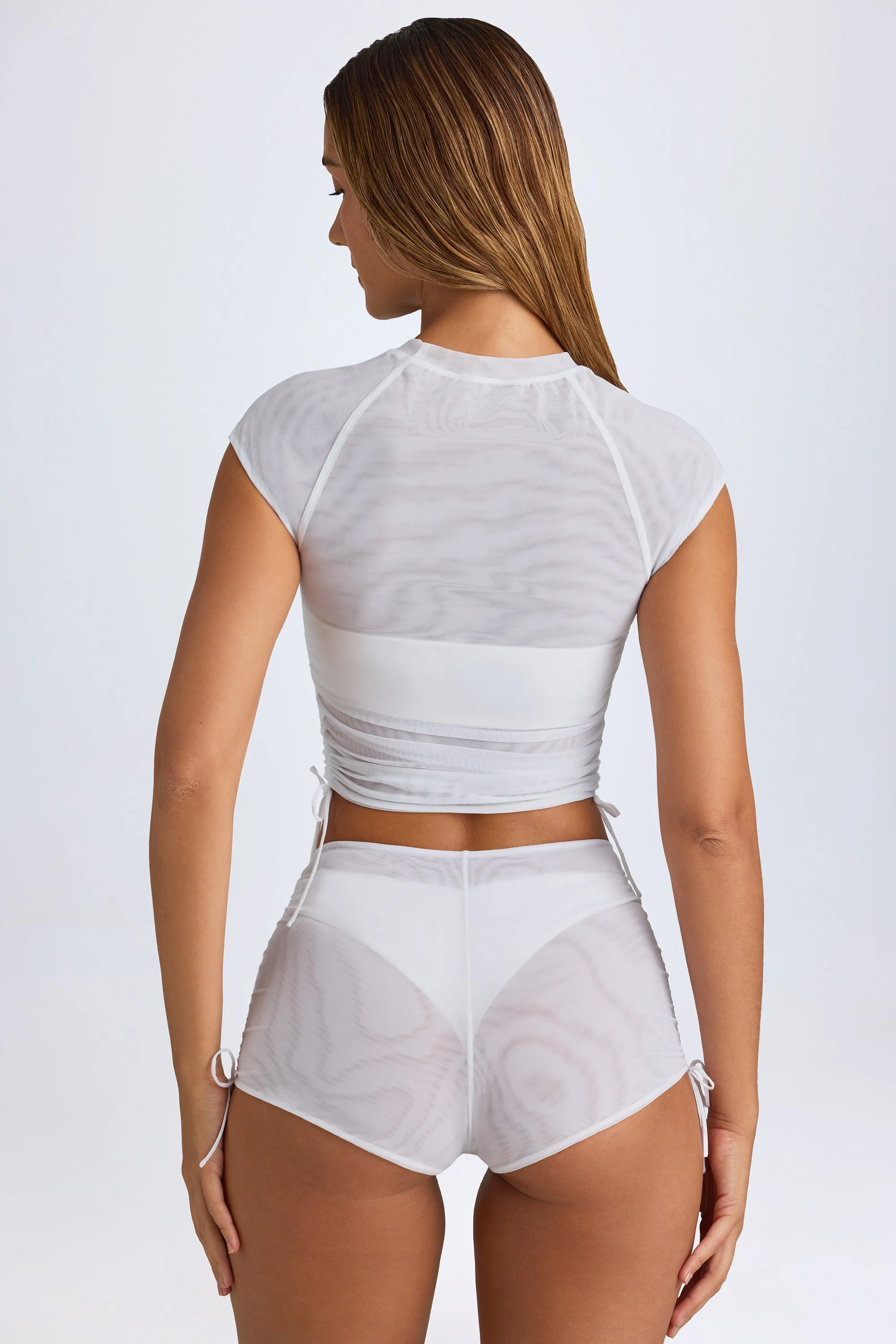 Sheer Ruched Mini Shorts in White - Image 7