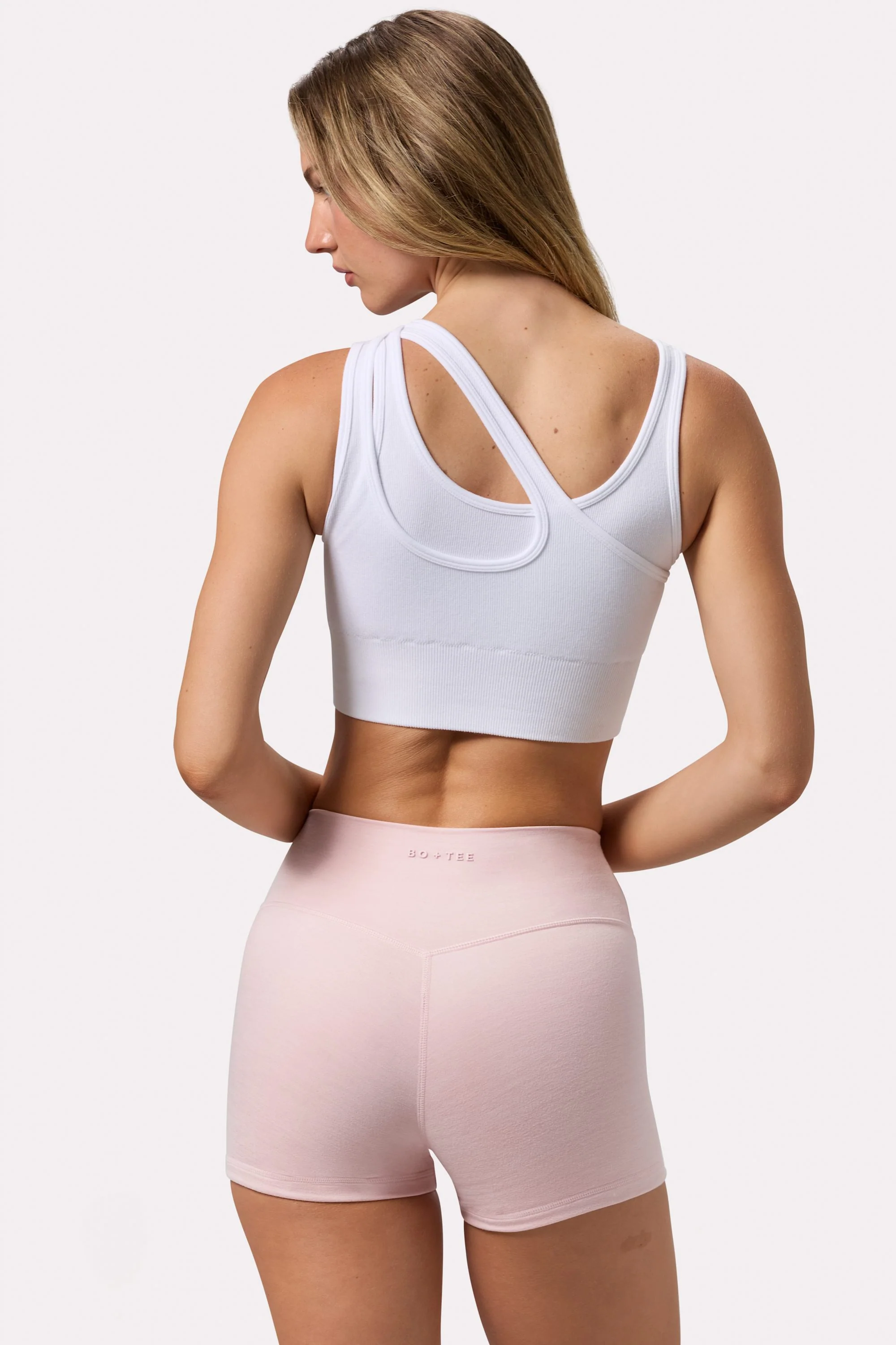 Seamless Soft Rib Asymmetric Sports Bra in White - Image 2