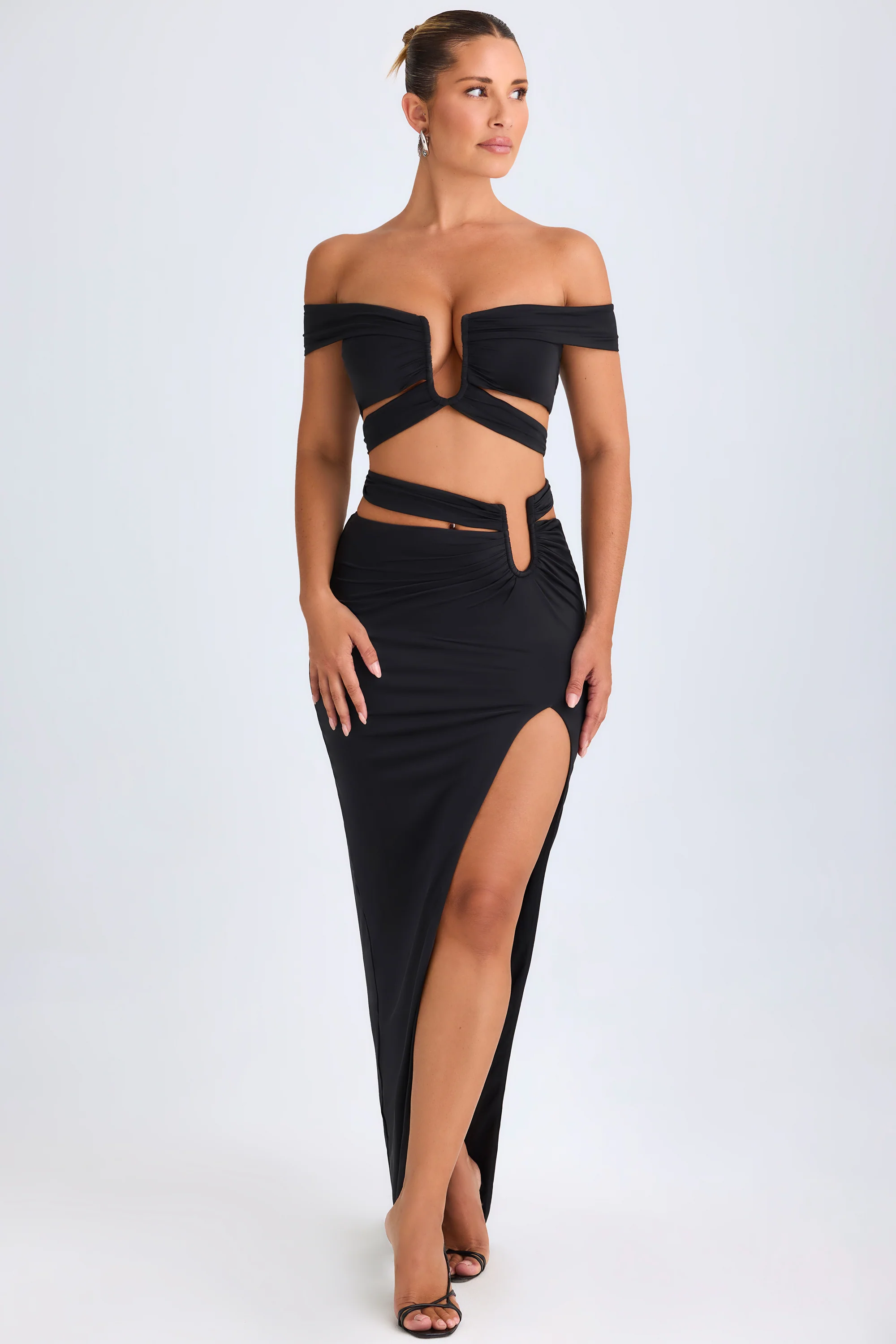 Asymmetric Cut-Out Maxi Skirt in Black - Image 4