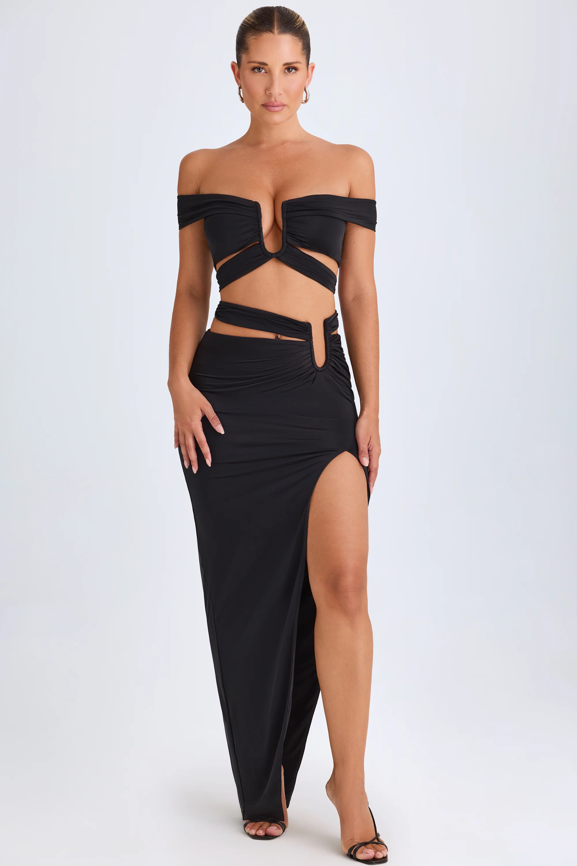 Asymmetric Cut-Out Maxi Skirt in Black - Image 9